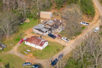 The aftermath of a home explosion above Oak Grove Mine that killed W.M. Griffice in Adger, Ala. Credit: Lee Hedgepeth/Inside Climate News