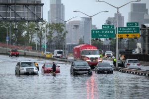 Cars move through floodwater caused by heavy rains on FDR Drive in Manhattan on Sept. 29, 2023. Credit: Ed Jones/AFP via Getty Images
