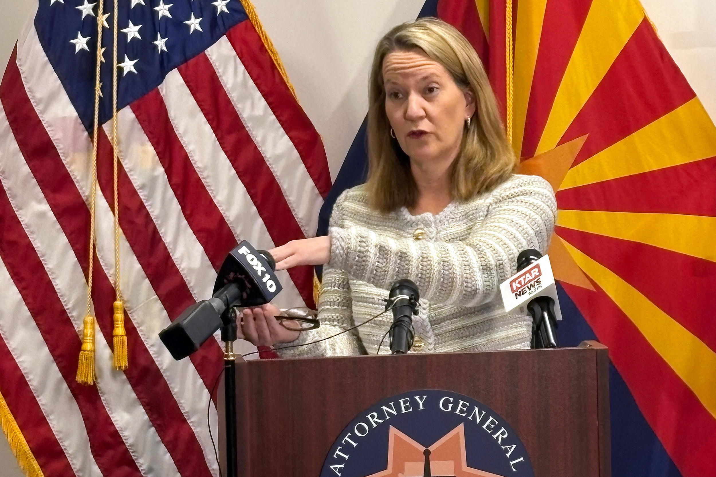 Arizona Attorney General Kris Mayes explains to the media how excessive groundwater pumping in La Paz county is causing ground subsidence in the community on Dec. 11. Credit: Wyatt Myskow/Inside Climate News