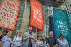 Demonstrators with GreenFaith gather as part of a global, multi-faith action called Faiths 4 Climate Justice outside of JPMorgan Chase headquarters in Manhattan on Sept. 14, 2023. Credit: Erik McGregor/LightRocket via Getty Images