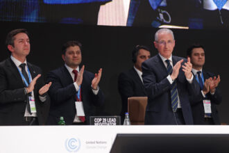 COP29 President Mukhtar Babayev (front right) and other committee members applaud the end of the UNFCCC climate conference in the early hours on Nov. 24 in Baku, Azerbaijan. Credit: Sean Gallup/Getty Images