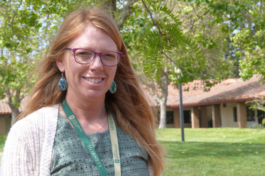Third-grade teacher Melissa Dennis stands in the courtyard of Ohlone Elementary School in Watsonville, where a monitor near the school playground has long detected unsafe levels of 1,3-D. Credit: Liza Gross/Inside Climate News