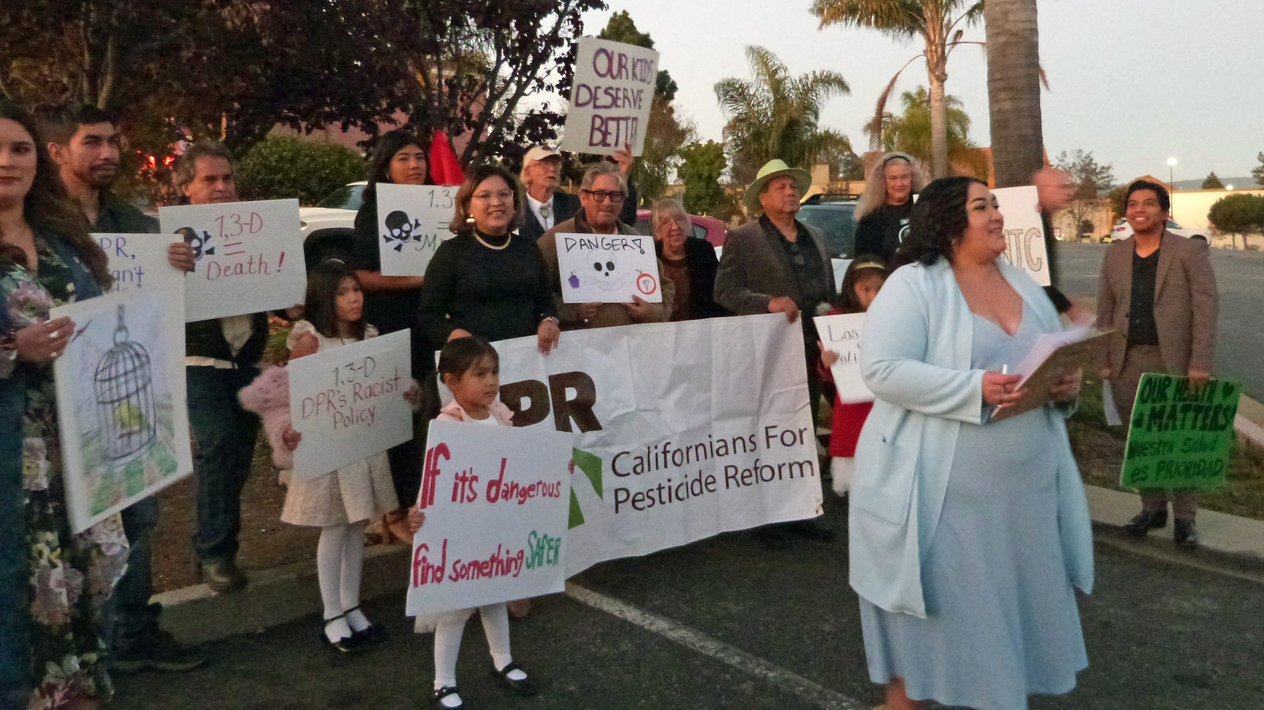 Yanely Martinez, an organizer with Californians for Pesticide Reform, calls on state pesticide regulators to end its "separate and unequal" rules at a protest in Watsonville. Credit: Liza Gross/Inside Climate News
