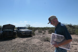 Eric Selinger walks on his property near the Pecos River outside Imperial, Texas on Oct. 8. Credit: Martha Pskowski/Inside Climate News