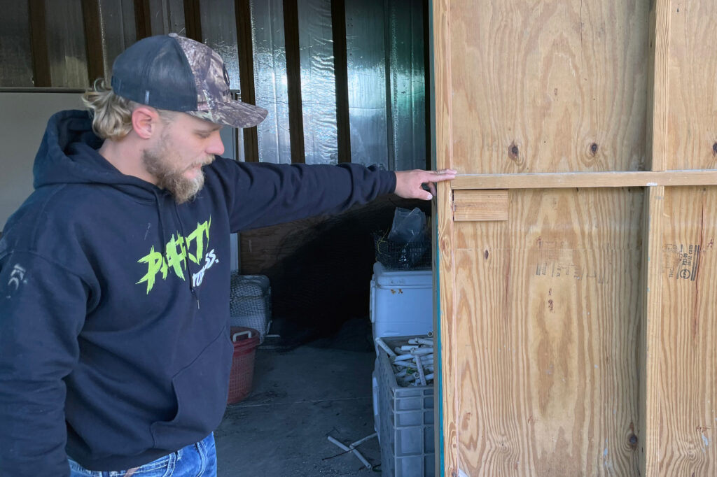 Timothy Solano, a clam farmer, said the processing facility where he works experienced substantial flooding during Idalia and Helene. The business plans to put hurricane relief funding toward building a sturdier facility on the mainland. Credit: Amy Green/Inside Climate News