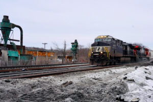 A Norfolk Southern freight train runs past the site of the February 2023 derailment on the outskirts of East Palestine, Ohio. Credit: Phil Zhang/Xinhua via Getty Images