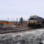 A Norfolk Southern freight train runs past the site of the February 2023 derailment on the outskirts of East Palestine, Ohio. Credit: Phil Zhang/Xinhua via Getty Images