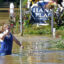 A Chadds Ford resident looks for his car which floated away from a repair shop following historic flooding caused by Hurricane Ida in southeastern Pennsylvania. Credit: Pete Bannan/MediaNews Group/Daily Times via Getty Images