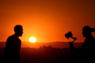 The sun sets on Sept. 5, 2024, in Los Angeles where temperatures hit 100 degrees Fahrenheit (38C). Credit: Frederic J. Brown/AFP via Getty Images