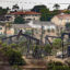 Homes sit in the shadows of the Inglewood Oil Field in Los Angeles on Sept. 25, 2024. Credit: Jason Armond/Los Angeles Times via Getty Images
