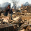 Khaled Fouad (left) and Mimi Laine embrace as they inspect a family member’s property that was destroyed by the Eaton Fire on Jan. 9 in Altadena, Calif. Credit: Justin Sullivan/Getty Images