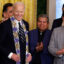 Former President Joe Biden is given a ceremonial sash after singing proclamations creating the Chuckwalla National Monument and the Sáttítla Highlands National Monument at the White House on Jan. 14. Credit: Kevin Dietsch/Getty Images