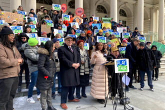 City Council member Selvena Brooks-Powers, a representative for Queens, speaks on the steps of New York City Hall at a rally organized by the Play Fair Coalition last week. Credit Lauren Dalban/Inside Climate News