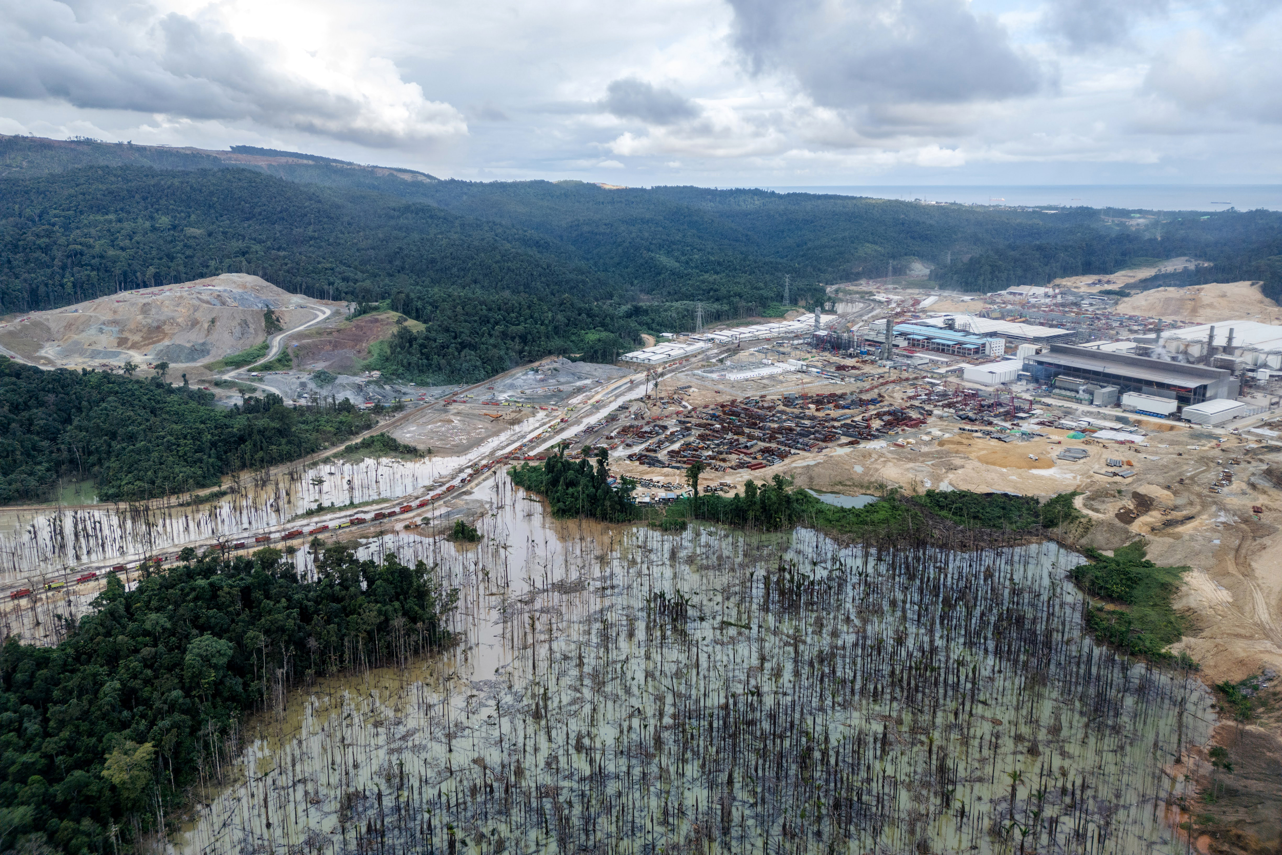 Massive nickel mines operated by different companies occupy land cleared of forest in Central Halmahera.