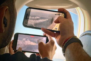 Passengers record images of the Palisades and Eaton fires from a commercial flight above Los Angeles on Jan. 11. Credit: Michael Kodas/Inside Climate News