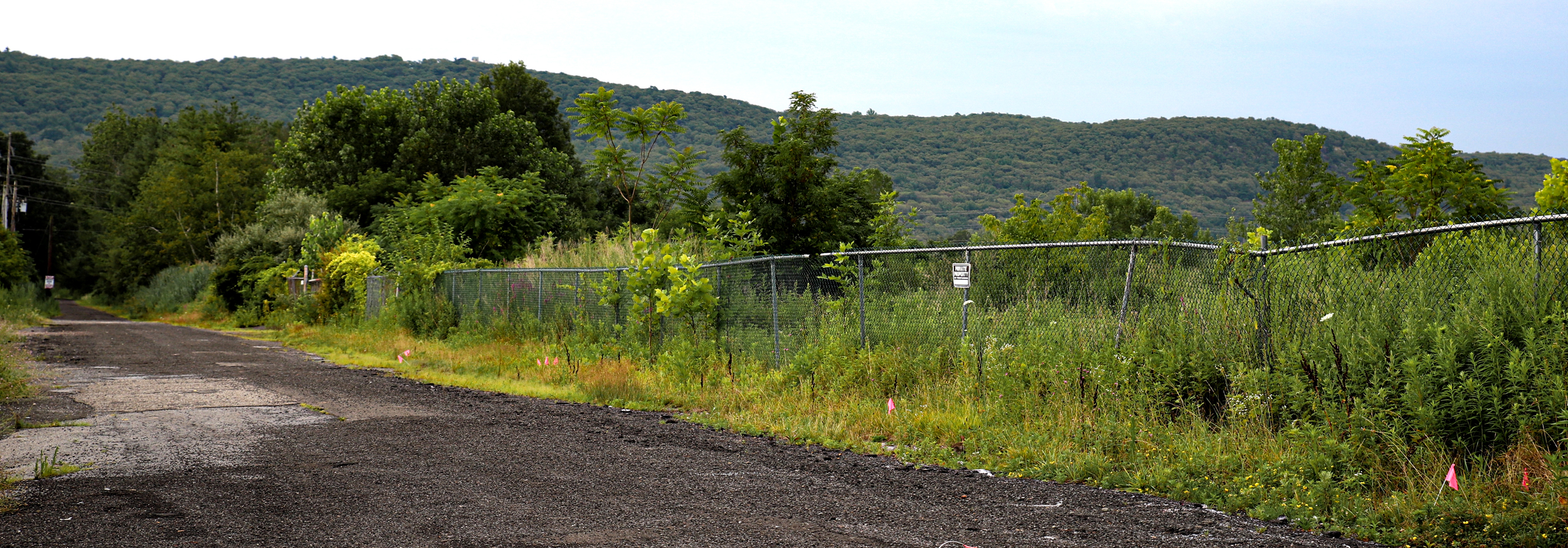 A view of the site of the former Nepera Chemical Plant, which straddles the border between Woodbury and Harriman, N.Y. A 2019 plan to turn the site into a gambling destination broke down when the property’s environmental condition proved more severe than anticipated. Credit: Daniel Propp/Inside Climate News
