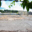 Rusted barrels and cracked concrete are all that remain of the former Glidden Paint Plant in Reading, Pa. State funding has been allocated to remediate the site prior to a planned redevelopment. Credit: Daniel Propp/Inside Climate News