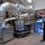 Rusty Towell, the founding director of Abilene Christian University's Nuclear Energy Experimental Testing, describes the workings of a molten salt testing device installed in the NEXT lab at Abilene Christian University. Credit: Ronald W. Erdrich/Abilene Reporter-News