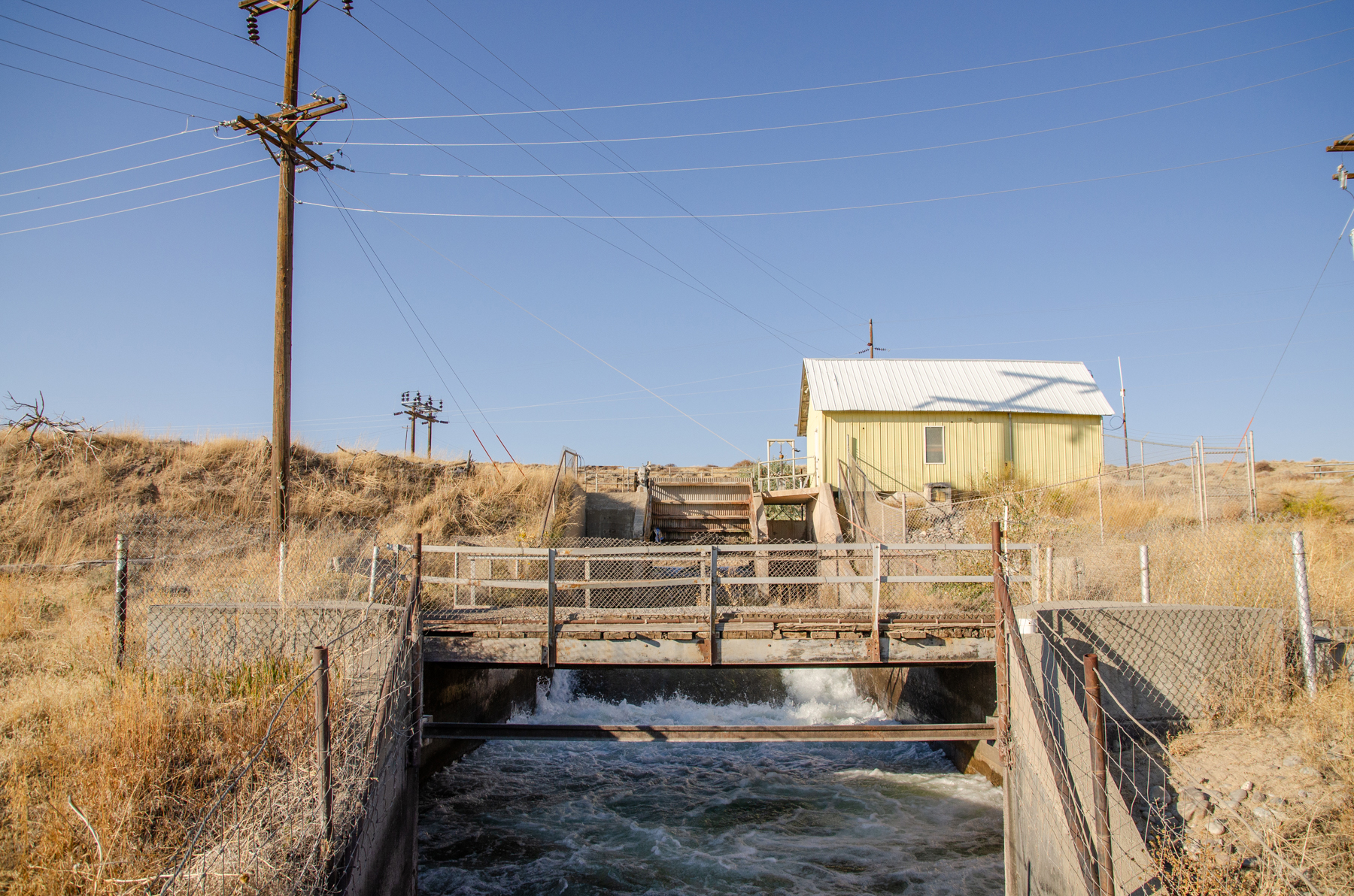 This penstock feeds Pilot Butte Reservoir and is part of the aging infrastructure that used to power a hydroelectric dam. Credit: Jake Bolster/Inside Climate News