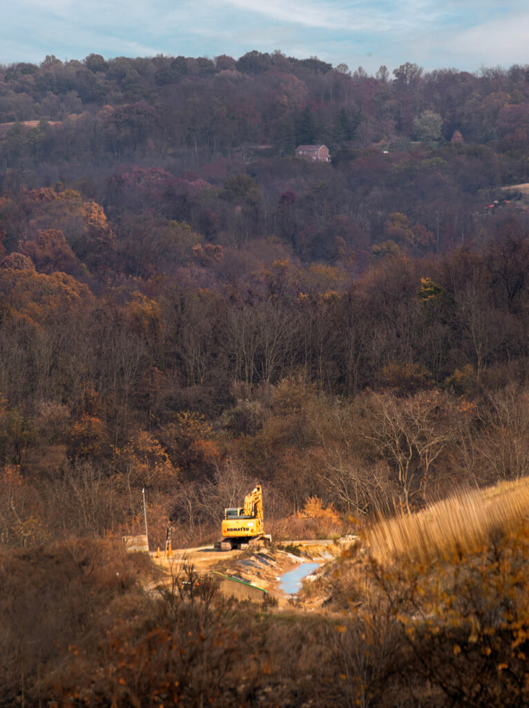 An accumulation of toxic chemicals rests at the base of the Yukon landfill. Credit: Scott Goldsmith/Inside Climate News