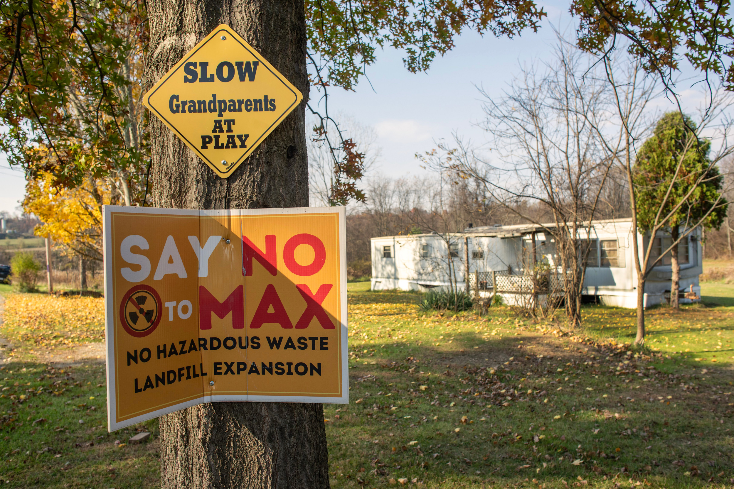 Many residents in Yukon have signs in their yards protesting the landfill and Max Environmental. Credit: Scott Goldsmith/Inside Climate News