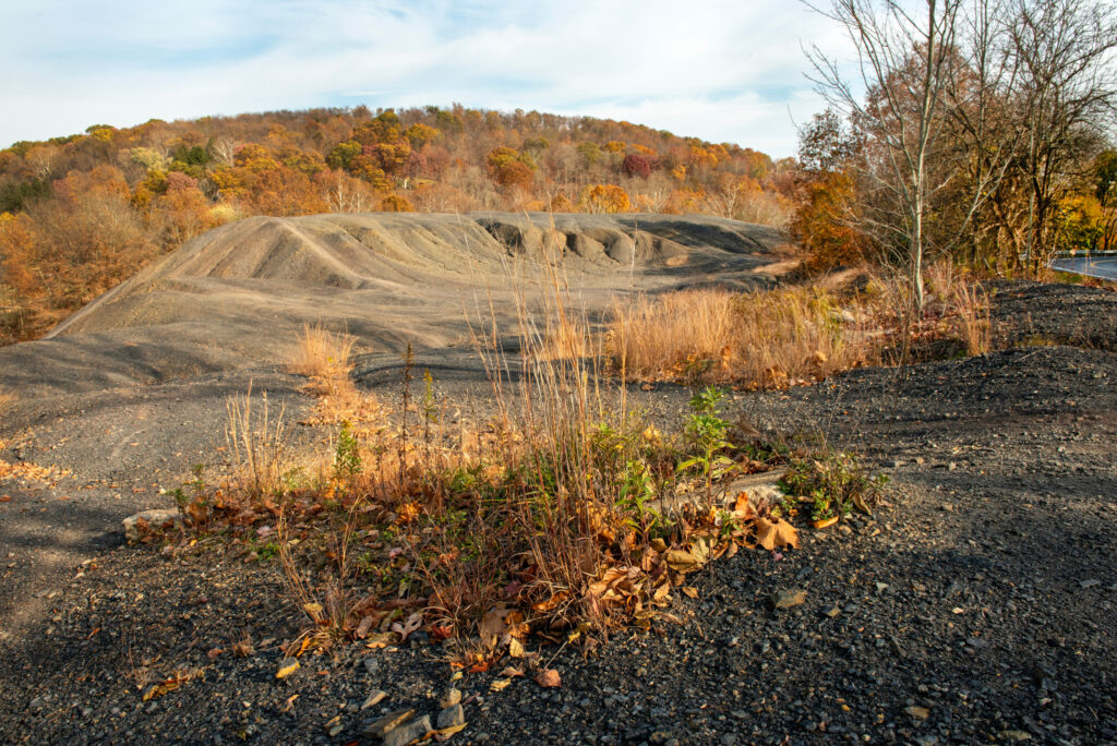 Coal waste in Yukon contributes to contaminated water runoff. Credit: Scott Goldsmith/Inside Climate News