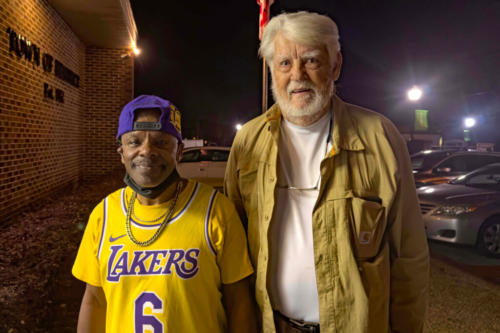 Valentino Thames (left) and Jerry Johnson have lived in Chestnut for years. Both believe that public officials have a moral duty to help them access public water. Credit: Lee Hedgepeth/Inside Climate News