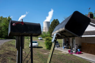 Steam rises from the James H. Miller Jr. Electric Generating Plant in the background of a home in Adamsville, Ala. Credit: Andrew Caballero-Reynolds/AFP via Getty Images