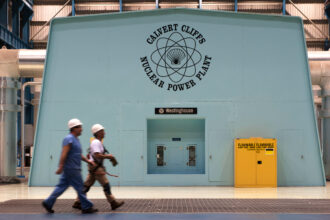 Workers walk past a turbine inside the Calvert Cliffs nuclear power plant in Lusby, Md. Credit: Marvin Joseph/The Washington Post via Getty Images