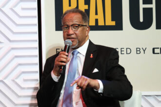 Rev. Ben Chavis speaks as panelist for the Real Talk Drives Real Change Tour at the Lincoln Theatre in Washington, D.C. on on June 26, 2022. Credit: Brian Stukes/Getty Images
