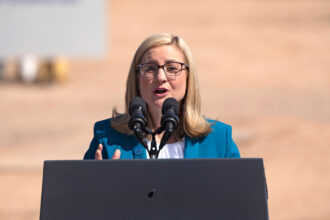 Phoenix Mayor Kate Gallego, who leads a network of mayors focused on climate action, speaks before President Joe Biden at the Intel Ocotillo Campus on March 20, 2024 in Chandler, Ariz. Credit: Rebecca Noble/Getty Images
