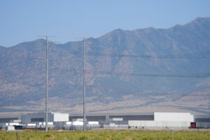 Large electrical transmission lines are routed to Meta's data center in Eagle Mountain, Utah. Credit: George Frey/AFP via Getty Images