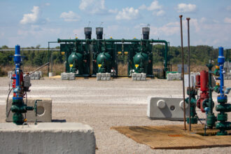 A natural gas well pad is seen on a farm in West Bethlehem Township, Pa. on Sept. 6, 2024. Environmental advocates in the state fear that spiking data center demand will be powered by natural gas. Credit: Rebecca Droke/AFP via Getty Images