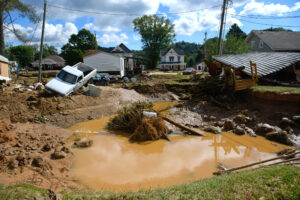 Damage and residual flooding is seen in the aftermath of Hurricane Helene on Sept. 29, 2024 in Old Fort, N.C., a community listed as disadvantaged by the Climate and Economic Justice Screening Tool. Credit: Melissa Sue Gerrits/Getty Images