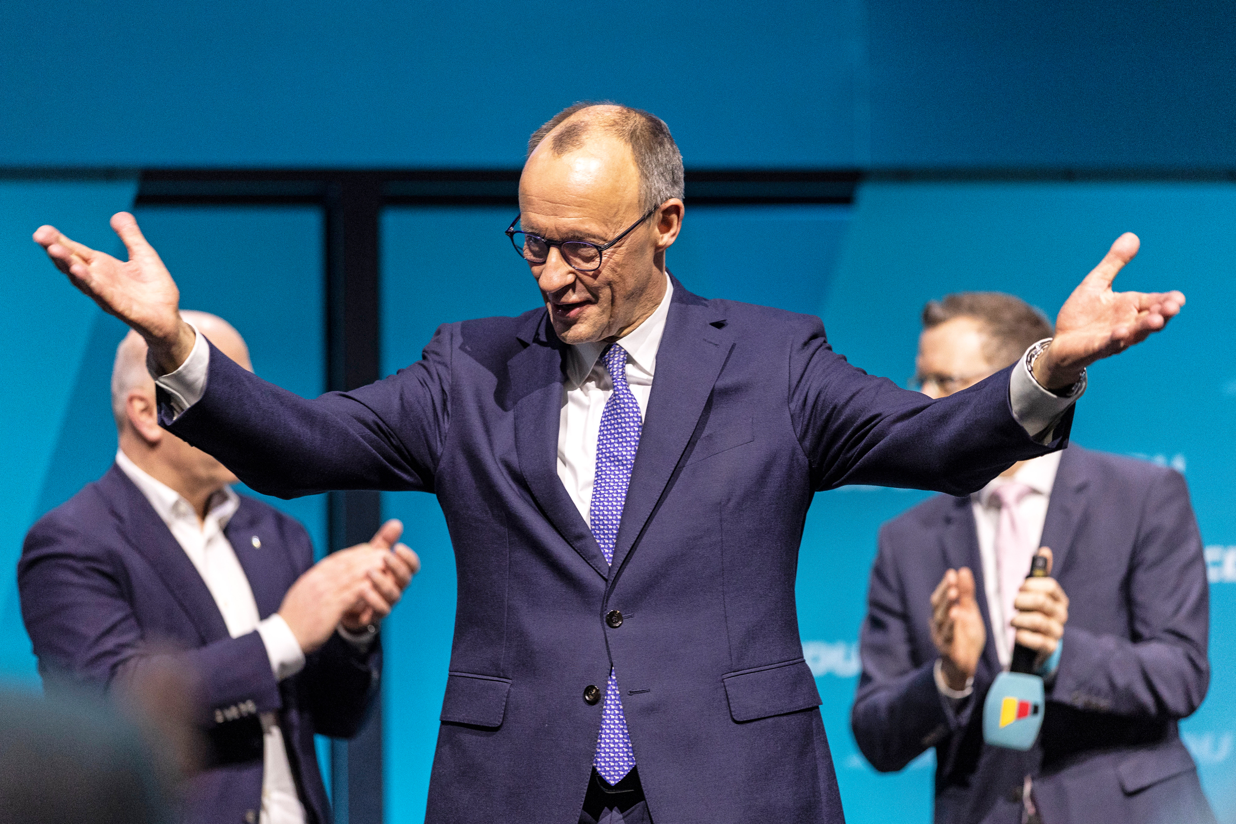Friedrich Merz, chancellor candidate of Germany’s Christian Democratic Union, reacts after his speech during an election campaign stop on Feb. 20 in Berlin. Credit: Maja Hitij/Getty Images