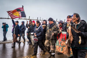 Demonstrators march to protest the Dakota Access Pipeline in North Dakota on Feb. 22, 2017. Credit: Michael Nigro/Pacific Press/LightRocket via Getty Images