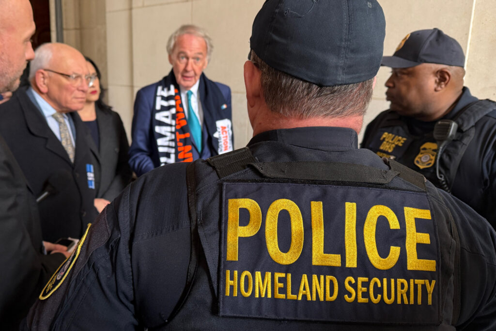 Flanked by fellow lawmakers, Sen. Ed Markey explains the purpose of his EPA visit to the Department of Homeland Security personnel. Credit: Aman Azhar/Inside Climate News
