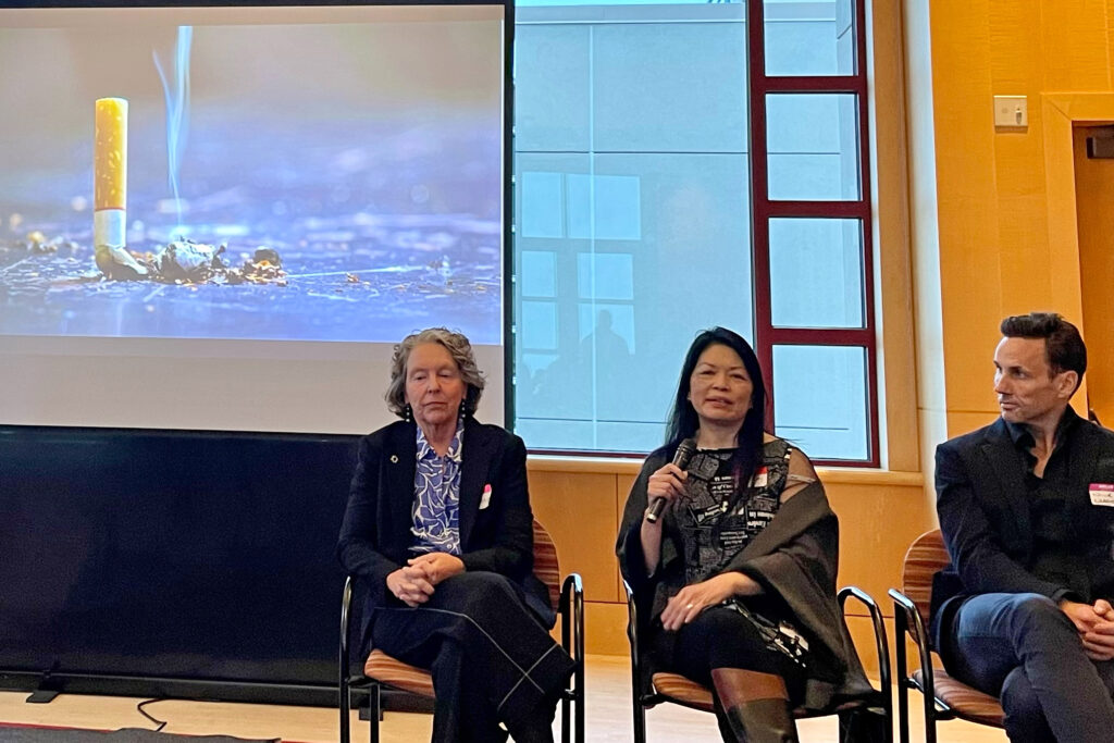 Pam Ling, director of the Center for Tobacco Control Research and Education at UC San Francisco, speaks during the launch of the new Center to End Corporate Harm. She's joined by Lisa Bero (left) and Nicholas Chartres, senior research fellow at the University of Sydney. Credit: Liza Gross/Inside Climate News
