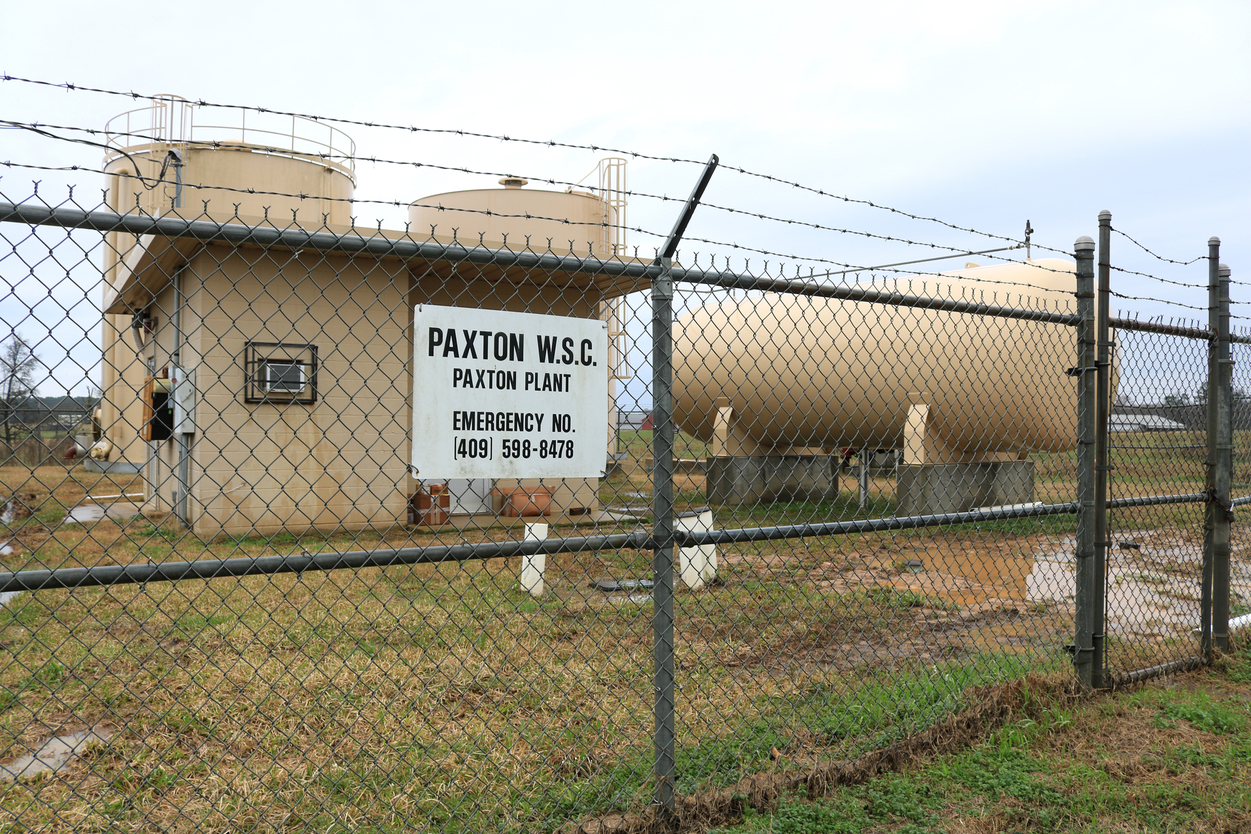 Two wells of the Paxton Water Supply Corporation sit about 1,000 yards away from the proposed oilfield waste disposal site. Credit: Dylan Baddour/Inside Climate News