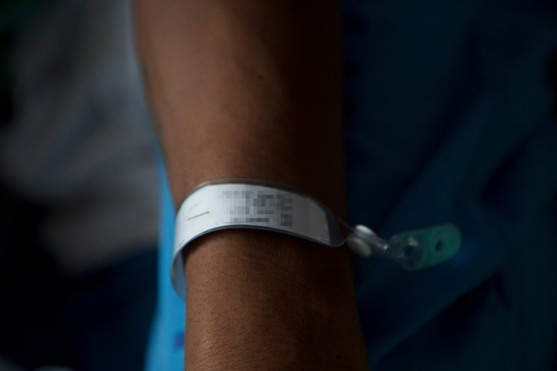 The hospital bracelet of one Cambodian fisherman who worked on a fishing vessel in Saya de Malha, at a hospital in Thailand on January 16, 2016, undergoing treatment for beriberi. Credit: Greenpeace Southeast Asia/The Outlaw Ocean Project