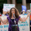 Rabbi Jennie Rosenn, founder and CEO of Dayenu, speaks at a Jewish climate action event in New York City on Sept. 12, 2021. Credit: Jemal Countess/Getty Images for Green New Deal Network