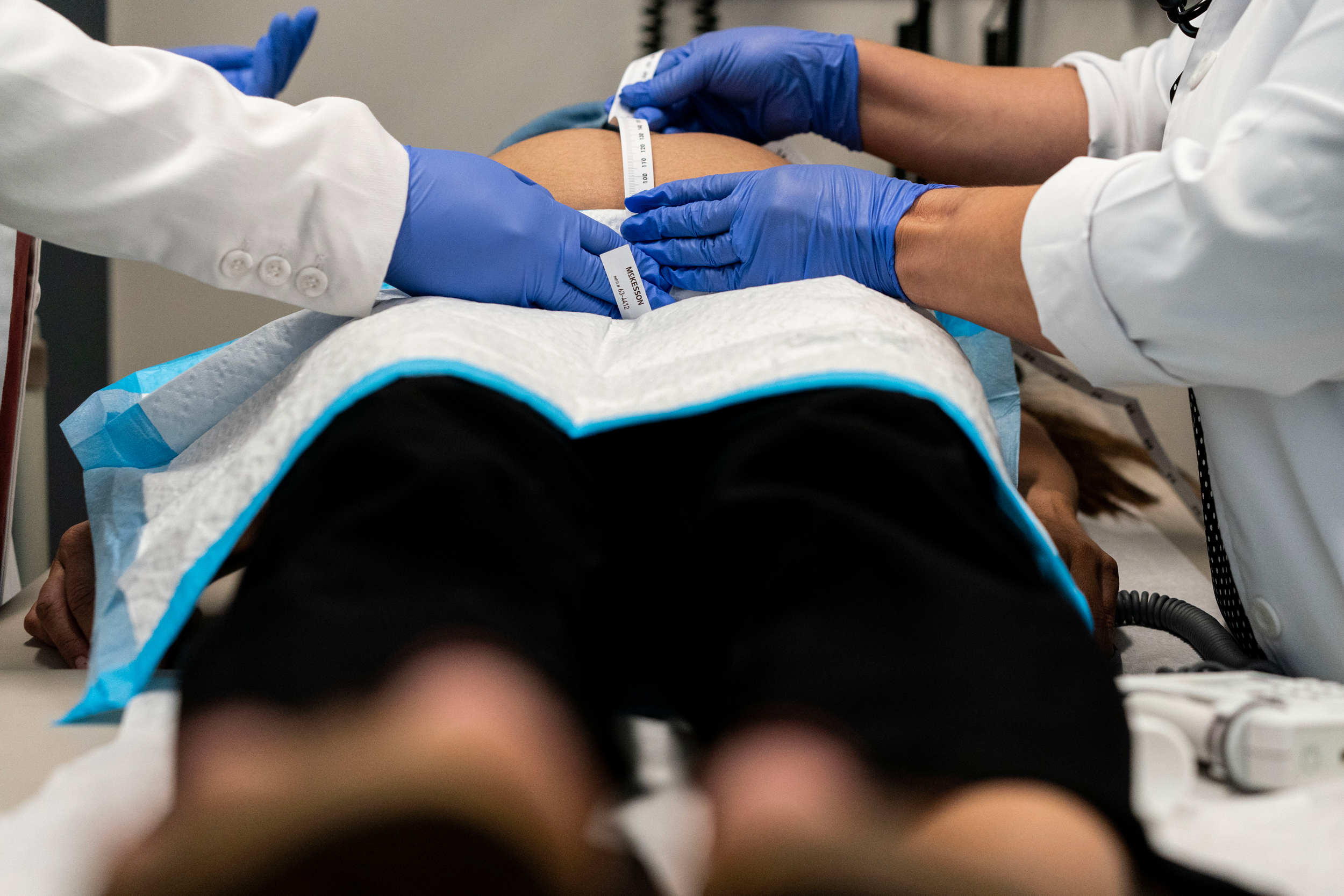 Health care professionals examine a pregnant patient at Camerena Health Systems in Madera, Calif. on Sept. 13, 2023. Credit: Melina Mara/The Washington Post via Getty Images