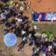 People attend the burial of indigenous environmental activist Quinto Inuma Alvarado, leader of the Kichwa community in remote Peru, on Dec. 2, 2023. Credit: Christian Sierra/AFP via Getty Images