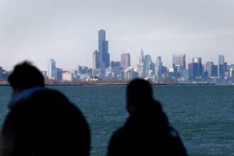 The Chicago skyline is seen across Lake Michigan from Whiting, Ind. Credit: Scott Olson/Getty Images
