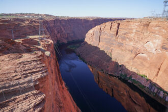 An aerial view of the Colorado River near the Glen Canyon Dam in Page, Ariz., as drought conditions affect the Southwest on June 18, 2024. Credit: Bryan R. Smith/AFP via Getty Images