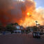 Plumes of smoke fill the sky as a brush fire burns on Jan. 7 in Pacific Palisades, Calif. Credit: David Swanson/AFP via Getty Images