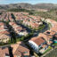 An aerial view of Orchard Hills in Irvine, Calif., where homes have been built to be fire-resistant. The neighborhood handled a fire very well in 2020 due to home construction, community planning, and partnership with the city. Credit: Allen J. Schaben/Los Angeles Times via Getty Images
