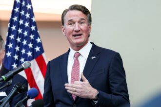 Virginia Gov. Glenn Youngkin gives a speech on Feb. 24 in McLean, Va. Credit: Valerie Plesch/The Washington Post via Getty Images