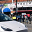 People participate in a protest against Elon Musk outside a Tesla dealership on March 8 in Pasadena, Calif. Credit: Frederic J. Brown/AFP via Getty Images