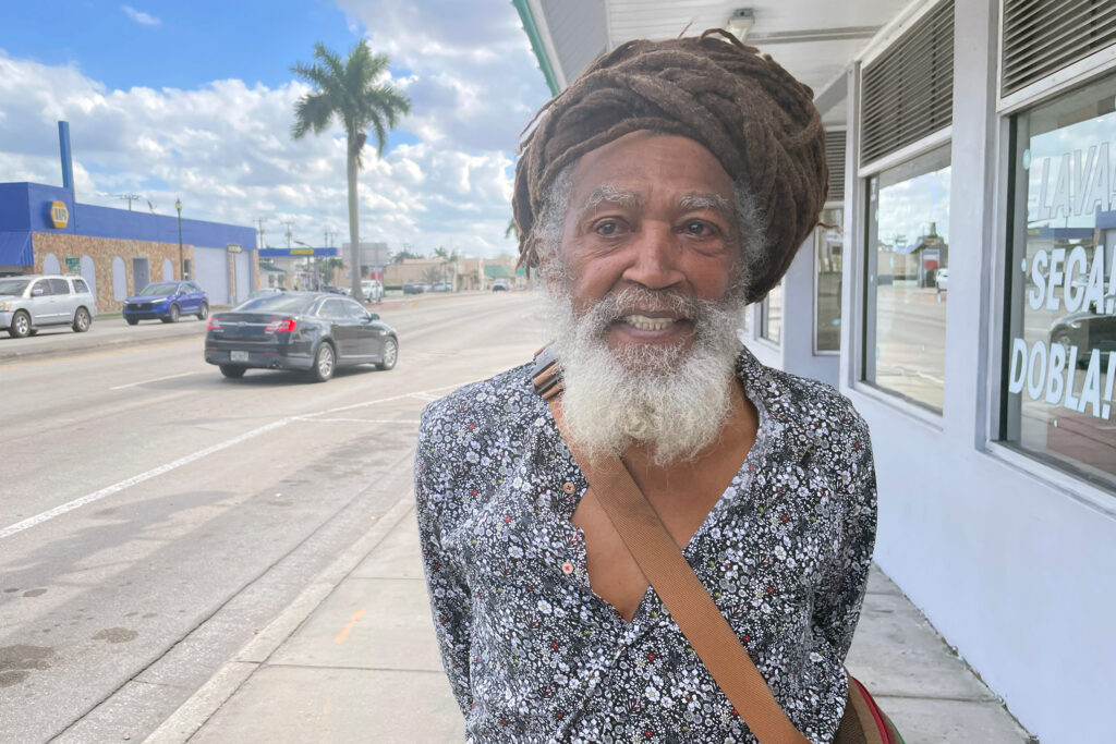 Ras Benjahman said he can feel the heat of the burns inside his home, and that parts of the exterior have melted. Credit: Amy Green/Inside Climate News